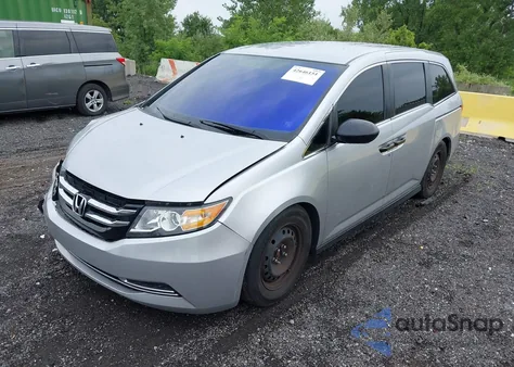 2015 Honda Odyssey Lx z USA, uszkodzony, nr VIN 5FNRL5H20FB080993